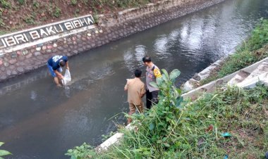 Polisi-Bersama-Perangkat-Desa-Tebar-10.000-Bibit-Ikan-di-Bondowoso,Wujudkan-Ketahanan-Pangan